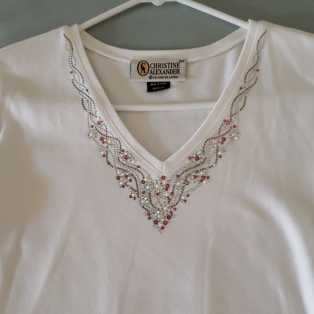 Top with pink and silver rhinestones. And pearls.